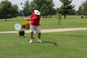 man golfing