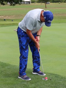 man golfing